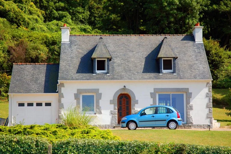 A house in the French countryside, representing rural and regional living options in France